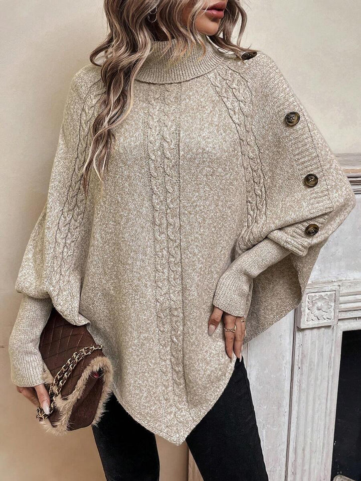 Alexis | Höghalsad Batwing Poncho Tröja, Asymmetrisk Kabelstickad Pullover