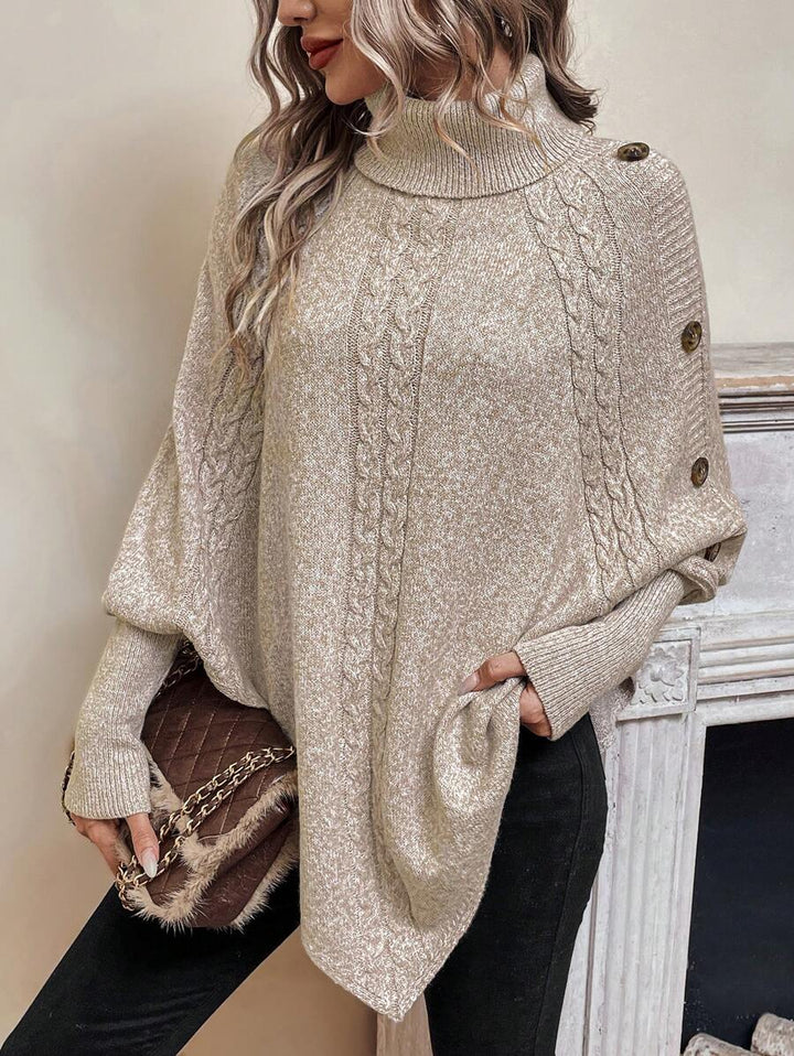 Alexis | Höghalsad Batwing Poncho Tröja, Asymmetrisk Kabelstickad Pullover