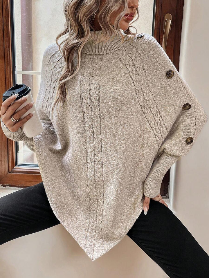 Alexis | Höghalsad Batwing Poncho Tröja, Asymmetrisk Kabelstickad Pullover