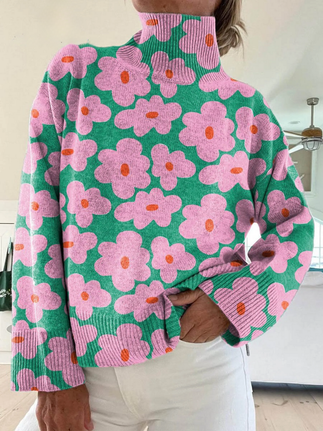 Torborg blommig stickad polotröja i grönt och rosa