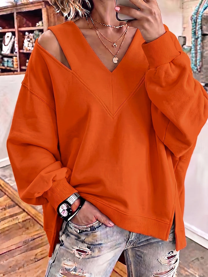 Kalista | Chic Sweatshirt med V-ringning och Cutout-detaljer i Oversize-modell