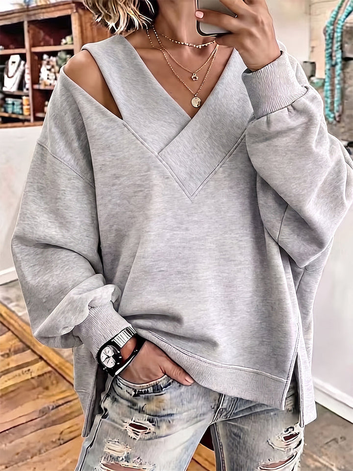 Kalista | Chic Sweatshirt med V-ringning och Cutout-detaljer i Oversize-modell