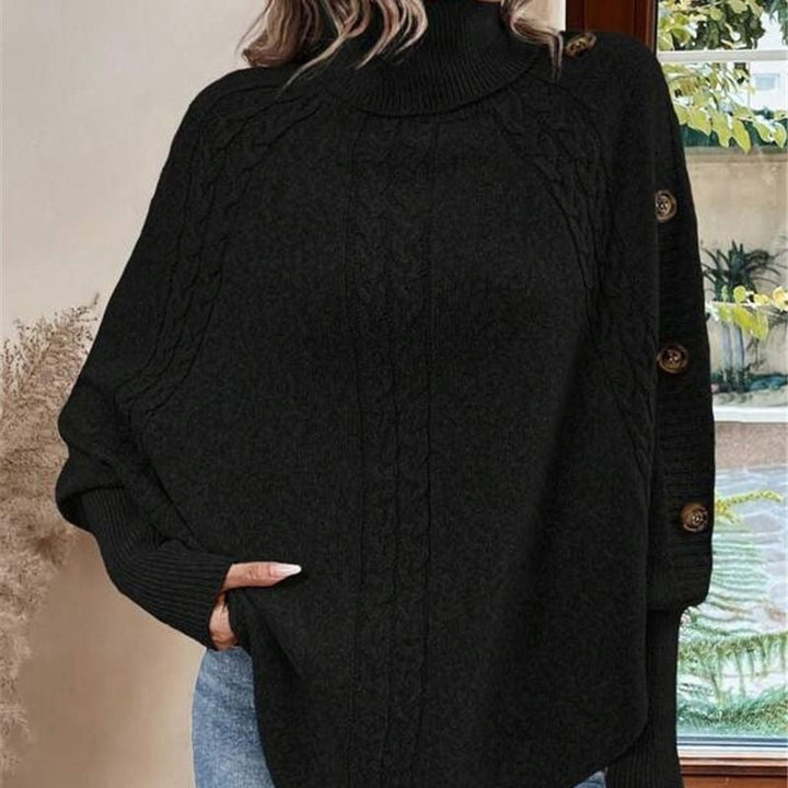 Gudrun svart ponchotröja med knappar
