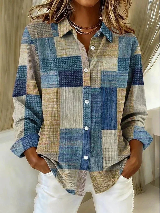 Ingamaj patchworkblus med färgblock i blått