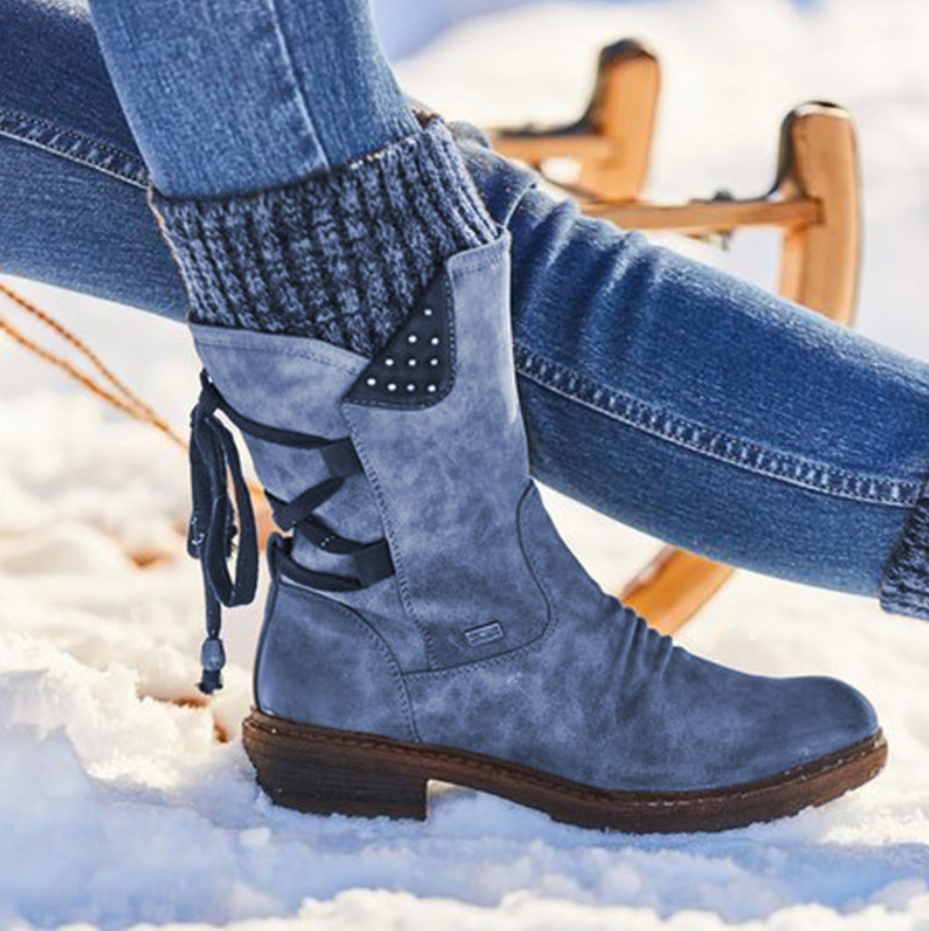 Christina – blå stövlar i snön