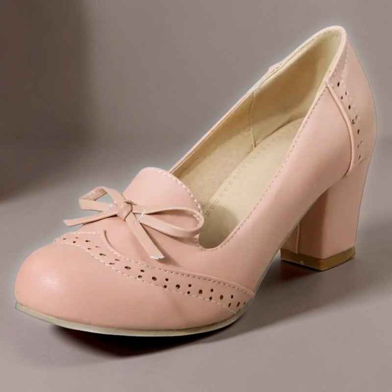 Marie-Louise – eleganta slip-on-pumps med rosett i rosa