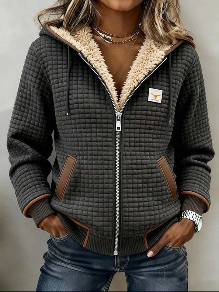 Sandra | Sherpa-fodrad quiltad zip-up huva jacka