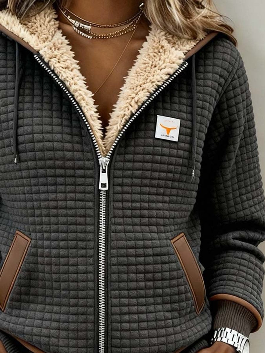 Sancha | Sherpa-fodrad quiltad zip-up huva jacka